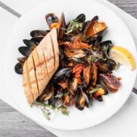 Mussels  · Choose from White Wine or Fra Diavolo