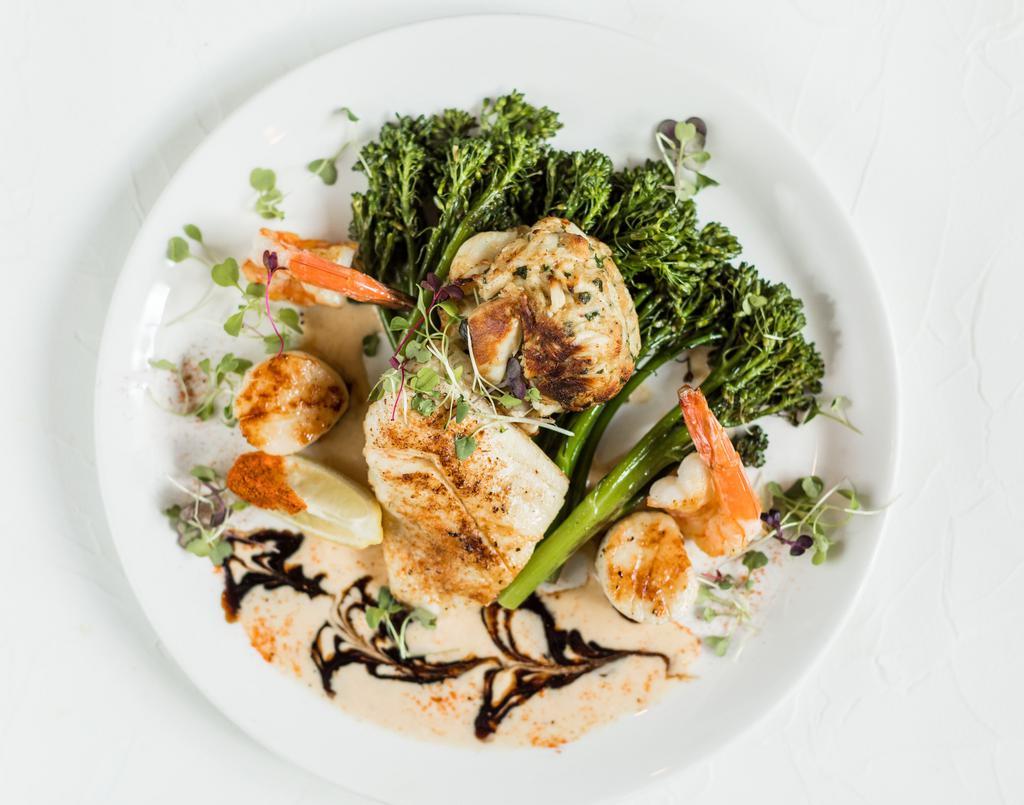 Captain'S Platter · 5 oz. Jumbo lump crab cake, Gulf shrimp, scallops, fries, seasonal vegetables