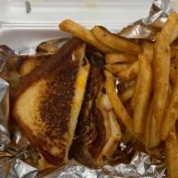 Grilled Cheese · A grilled cheese sandwich served with pickle and chips can substitute for fries for addition...