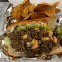 Shrimp Cheesesteak Sub · An overstuffed sub stuffed with a generous portion of shrimp and cheesesteak