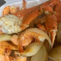 Combo #1 · 1 Snow crab cluster, 1/2 lb X Large gulf shrimp served with corn onions & potatoes