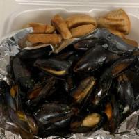 Mussels · 1lb mussels sauteed with garlic butter & served with toast points
