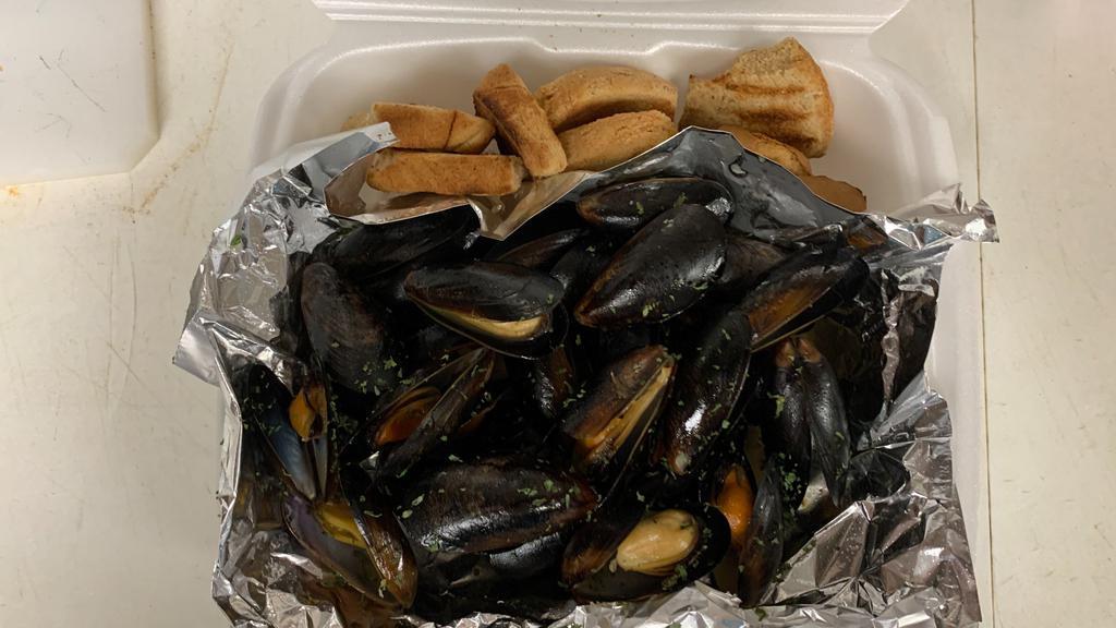1 Lb Steamed Mussels · steamed with seasoning served with butter