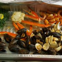 From The Bottom · 1/2 lb large shrimp, 1 snow crab cluster, 1lb little neck clams & 1lb mussels served with co...