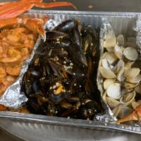 Seafood Jammer · 3lb mussels, 3lb littleneck clams, 2lb large shrimp, 2lb snow crab clusters, served with cor...
