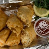 Seafood Egg Roll · 2-Egg rolls stuffed with crab meat & shrimp served with sweet chili sauce