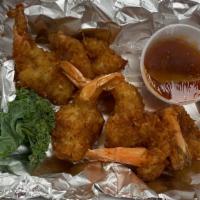 (6) Coconut Shrimp · butterflied & hand breaded in coconut served with sweet chili sauce