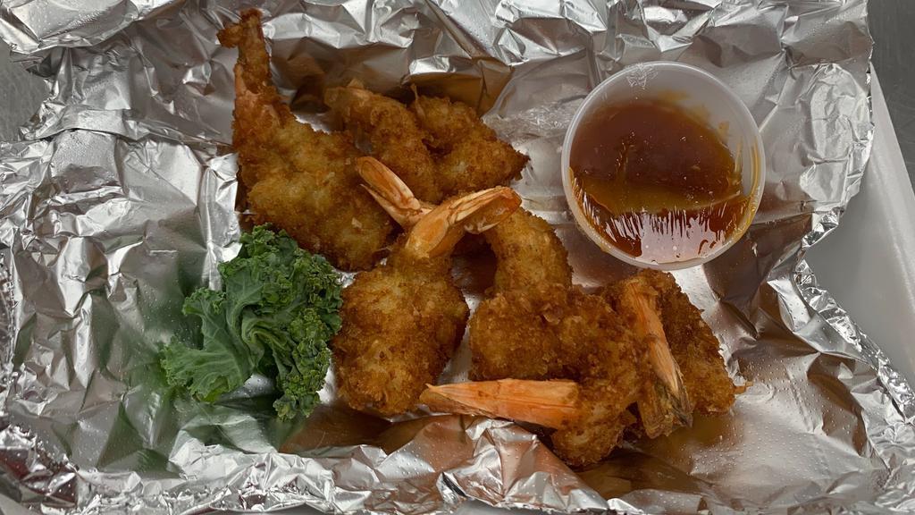 (6) Coconut Shrimp · butterflied & hand breaded in coconut served with sweet chili sauce