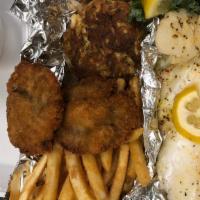 Captain'S Catch · (1) backfin crab cake, filet of orange roughy, (2) scallops & 2 oyster paddies 
*(can substi...