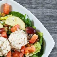 Waldorf Chicken Salad · Freshly made chicken salad mixed greens tomatoes grapes apples candied walnuts crisp celery ...