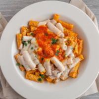 Baked Ziti · Rigatoni tossed with ricotta, parmesan, ground beef, mozzarella, with melted cheese and toma...