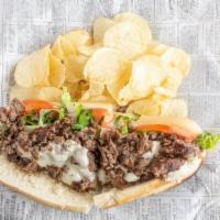 Cheesesteak · Made with lettuce, tomato, mayo, fried onions, hot peppers and provolone cheese