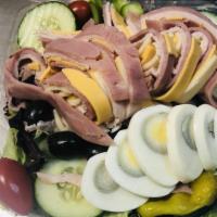 Chefs Salad (Large) · Garden salad topped with ham, turkey, cheese, boiled egg, olives and pepperoncini.