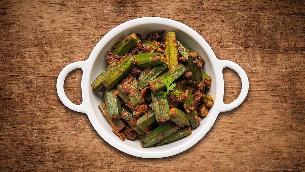 Okra Masala  · Freshly cut okras sautéed with onions, tomatoes and herbs. Served with a portion of aromatic basmati rice.
