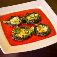 Shaam Savera · Fresh spinach and cottage cheese dumplings, cooked in a velvety tomato, and onion cream gravy.
