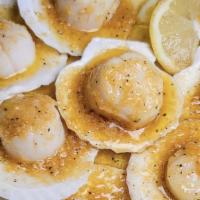 Steamed Scallops (10) · Scallops are first steamed then seasoned with one of our delicious seasonings. Garlic butter...