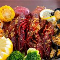The Cajun Boil · 1/2Lb Shrimp Head Off;
1/2Lb Crawfish;
1/2 Black Mussel