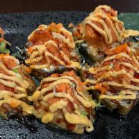 Volcano Roll (6 Pieces) · Spicy kani, avocado, and cream cheese in rolled rice lightly fried, topped with spicy tuna, ...