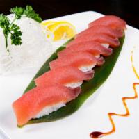 Tuna Lover · Spicy and raw. Seven tuna sushi and spicy tuna roll.
Consuming raw or undercooked meats, fis...