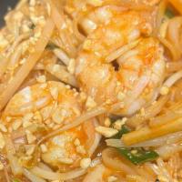 Pad Thai Noodles · Spicy. Traditional Thai rice noodles are stir-fried with bean sprouts, scallions and egg top...