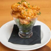 Barrel House Shrimp · 1/2 lb of lightly battered shrimp tossed in a sweet chili garlic sauce.