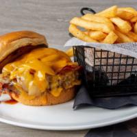Barrel Burger · 1/2 lb fresh Angus chuck topped with Cheddar, bacon, caramelized onions, and our house bourb...