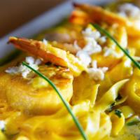 Fettuccine Zaferano  · Shrimp, scallops, lump crab meat, saffron cream sauce
