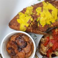 Deep Fried Red Snapper · Whole seasoned flour dipped, served with a sweet potato hash and sautéed cabbage and roasted...